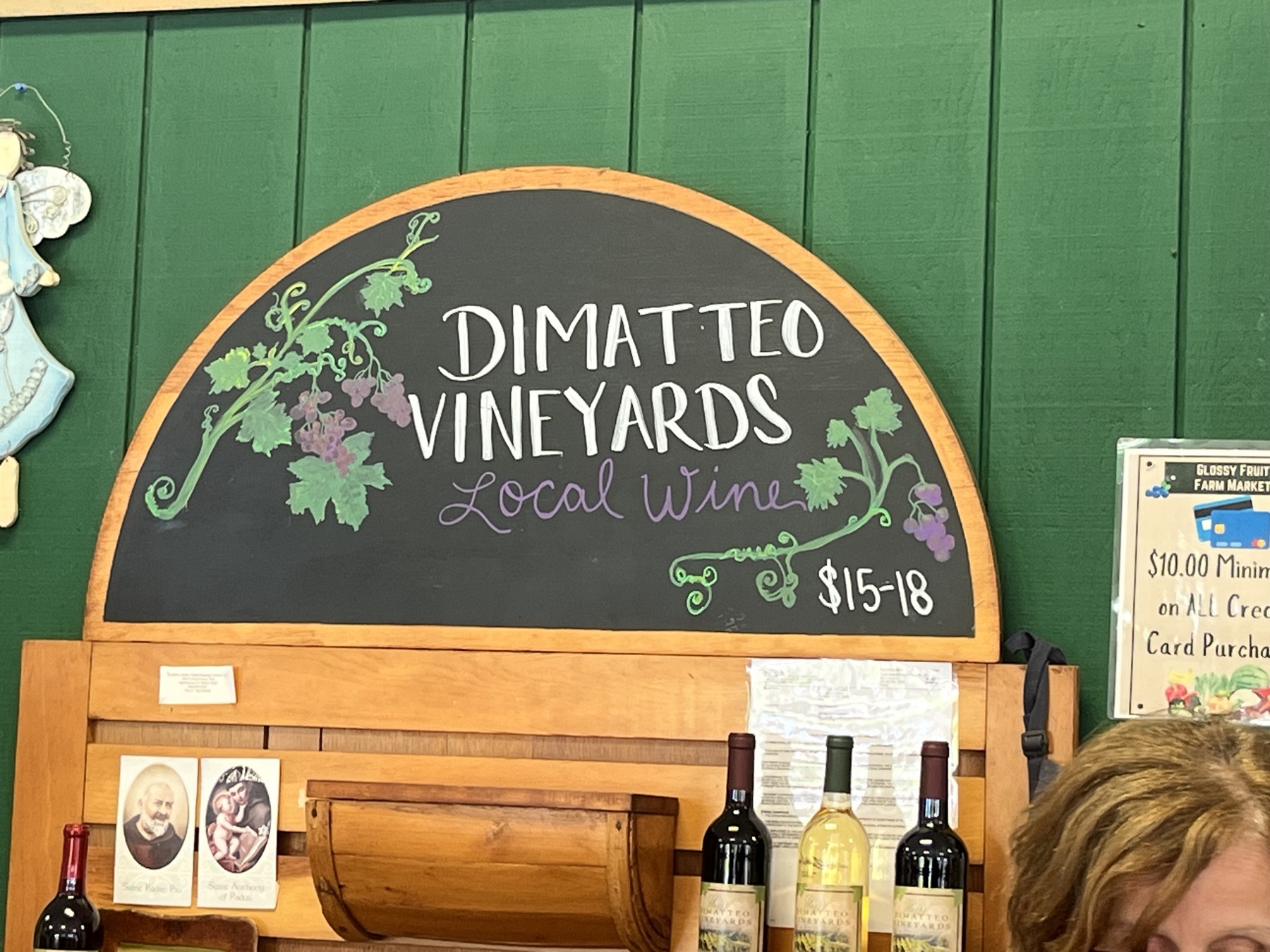 Custom chalkboard sign for DiMatteo Vineyards with grapevine illustrations